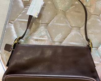 #205	Coach brown purse 	 $20.00 
