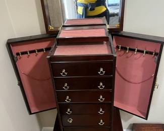 #61	Jewelry box on legs 18x11x41 w/side doors & flip-up top w/6 drawers	 $75.00 
