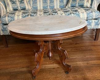 #12	East Lake Round Marble Top Coffee Table - 28x23x21 - on wheels	 $125.00 
