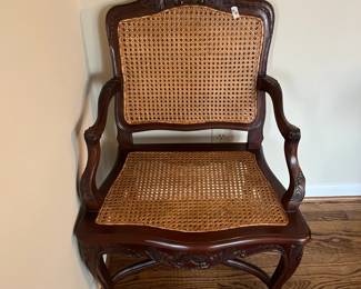 #10	Vintage cane seat and back carved arm side chair 	 $200.00 
