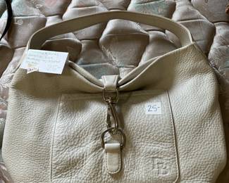 #208	 Dooney and burke Annalise  lock handbag w pebbled leather white	 $25.00 
