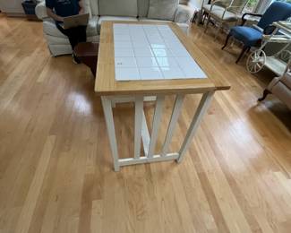 #27	Tall Laminate Tile Top Table - 24x36x34 w/2 stools - Stool height is 24" Tall	 $100.00 
