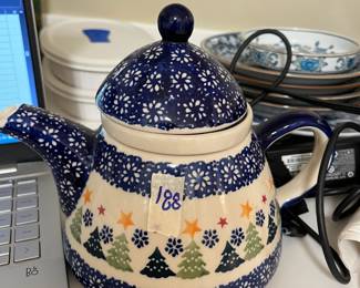 #188	polish pottery tea pot with christmas tree design 7 inch tall 	 $30.00 
