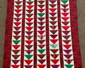 Red/green Flying Geese quilted blanket
