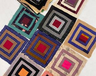 Many antique hand-sewn log cabin quilt blocks with silk