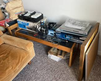 . . . coffee table topped with stereo components