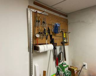 . . . another pegboard full of screw drivers and more