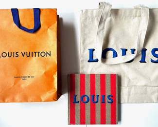 Louis Vuitton Catalogue Louis 200 In Factory Plastic, Canvas Tote Bag & Paper Bag, From Barneys New York
Lot #: 111
