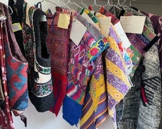 Assorted textile clothing (vests, huipils, scarves) from Guatemala, Uzbekistan, Mexico + more
