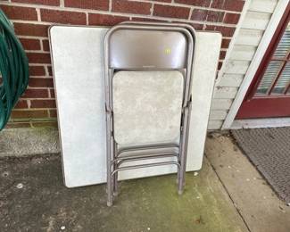 SAMSONITE FOLDING TABLE AND TWO CHAIRS