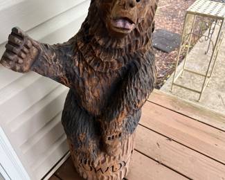 Carved Wood Bear on small stand - Says "Howdy" on the bottom