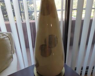 Two mid century style table lamps with geometric designs.