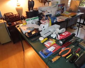 hand tools and electric cords and light bulbs.