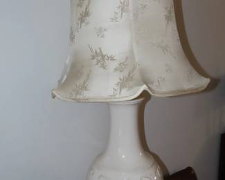 One of two tall table lamps.