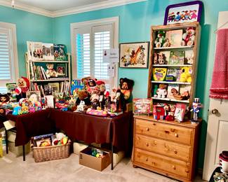 KID'S ROOM WITH FUN BOOKS, RAIKES CARVED BEARS, BABY DOLLS, AND RABBITS.  