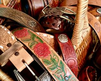 LEATHER TOOLED BELTS.