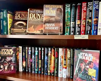 EARLY COPIES OF DUNE BY FRANK HERBERT INCLUDING MORE PAPERBACKS.