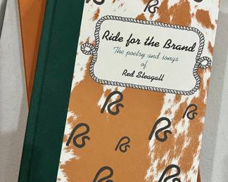 Signed Red Steagall “Ride for the Brand” in slip cover