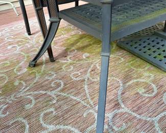 Take a look at this very unique Patio Table and Chairs.  Made from Aluminum Cast with Lattice Woven Style in the Chairs and Table.  The design features a Copper Element to the Chairs, Table and Umbrella Stand. The Table is 72" Long and 41" Wide.  There are 2 Swivel Rockers and 4 Dining Chairs. The cushions are in great condition by Sunbrella and  the Umbrella is from Garden Treasures and in Rectangular in shape . Purchased from Great Escape.