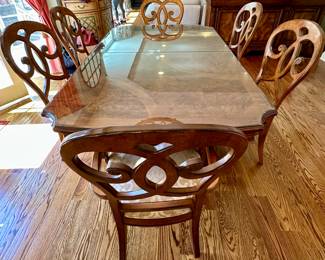 Thomasville Rivage Dining Table and Chairs.  The Table feature Double Pedestal Style witth 2 Armed Chairs and 4 Dining Chairs.  We also have the matching Rivage Buffet.