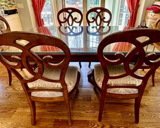 Thomasville Rivage Dining Table and Chairs.  The Table feature Double Pedestal Style witth 2 Armed Chairs and 4 Dining Chairs.  We also have the matching Rivage Buffet.