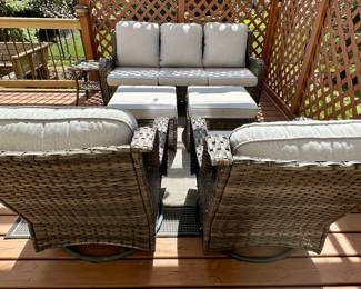 6 pc Outdoor Wicker Patio Set with Cushions.  Look at this current contemporary set at the perfect time before Spring and Summer.  It's rare to find this type of patio furniture that homeowners are selling.  3 Cushion Sofa,  2 Ottomans, 2 Glider/Rockers and 1 Side Table.  