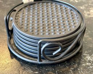 Neat. Set of Coasters 