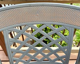 Take a look at this very unique Patio Table and Chairs.  Made from Aluminum Cast with Lattice Woven Style in the Chairs and Table.  The design features a Copper Element to the Chairs, Table and Umbrella Stand. The Table is 72" Long and 41" Wide.  There are 2 Swivel Rockers and 4 Dining Chairs. The cushions are in great condition by Sunbrella and  the Umbrella is from Garden Treasures and in Rectangular in shape . Purchased from Great Escape.