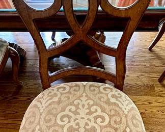 Thomasville Rivage Dining Table and Chairs.  The Table feature Double Pedestal Style witth 2 Armed Chairs and 4 Dining Chairs.  We also have the matching Rivage Buffet.