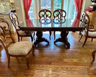 Thomasville Rivage Dining Table and Chairs.  The Table feature Double Pedestal Style witth 2 Armed Chairs and 4 Dining Chairs.  We also have the matching Rivage Buffet.