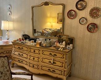 Lots of fun vintage 1960's French Provincial furniture.  This is one of the triple dressers with mirrors. 