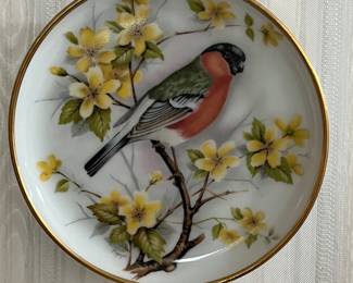 This home features a large collection of porcelain.  Many miniatures and plates.  Each wall in the home features a different collection.  If you love birds and avian motifs, this sale has it. 