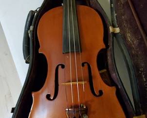 We have not 1, not 2, but 3 violins.  Including a Wilhelm Duerer 1915 Stradivarius replica!