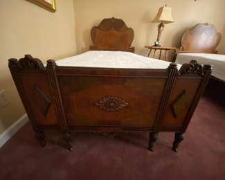 Detail of twin antique beds