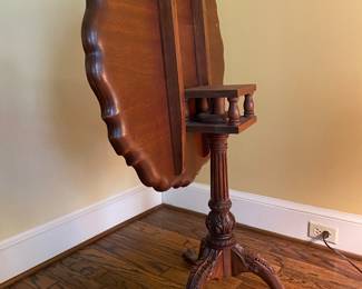 Antique craved, claw foot table