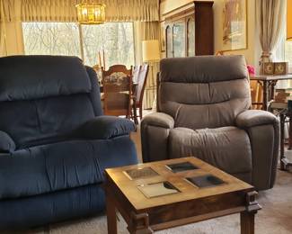 La z boy (Lazyboy) chairs both in excellent condition. Tan one electric adjustable and purchased recently with little wear