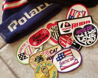 Super collection of dozens of NOS snowmobile patches - and vintage accessories, like these Polaris and Artic Cat caps