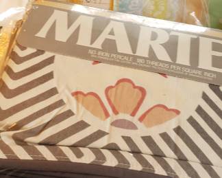 Many vintage sheet sets new in package