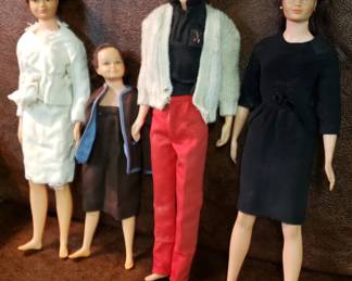 Dr. John, Lisa, Lily, and Judy Littlechap family dolls. Extra outfits