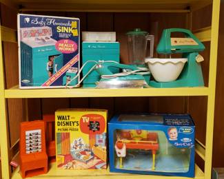 Vintage toys and games galore, including this Suzy Homemaker set