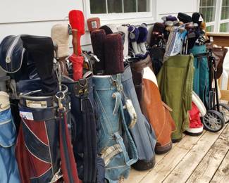 Tons of golf clubs - good starter sets, bags, balls, and accessories