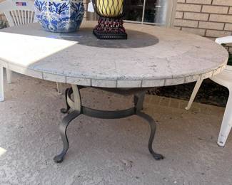 Stone and metal outdoor table