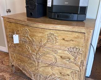 Carved chest of drawers, Bose acoustic wave music system