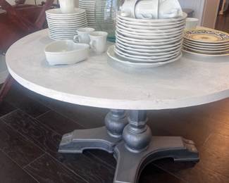Trestle base round dining table, Mikasa china