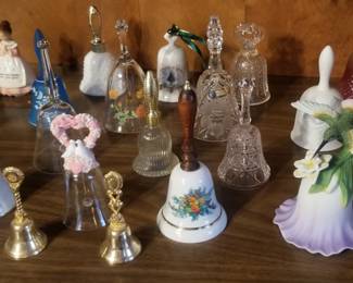 Variety of porcelain, glass, crystal, brass bells