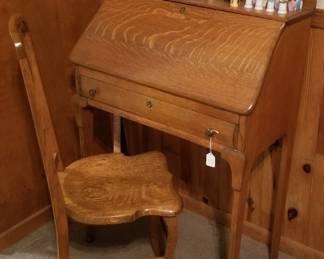 Quarter-sawn oak drop front ladies writing desk and chair; excellent condition.  Original mirror. 