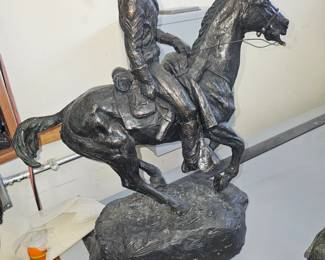 Tom Holland western sculpture.