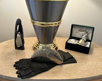 Elegant silver bell, purse, gloves, statue