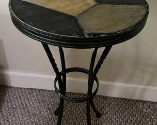 Metal table with stone top