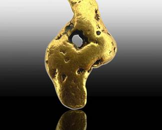 A Solid 18k Gold Nugget Pendant
